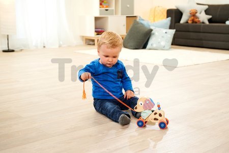 Drevený psík na ťahanie Dog Pull-along Animal Eichhorn s pohyblivou hlavou od 12 mes