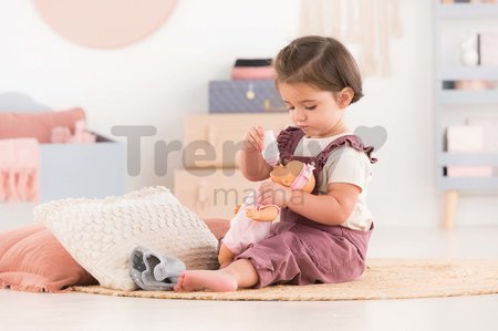 Bábika Bébé Calin Good Night Set Corolle s modrými klipkajúcimi očami a spacím vakom s fľašou a cumlíkom 30 cm od 18 mes