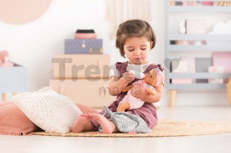 Bábika Bébé Calin Good Night Set Corolle s modrými klipkajúcimi očami a spacím vakom s fľašou a cumlíkom 30 cm od 18 mes