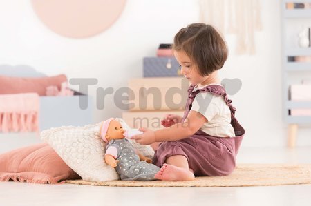 Bábika Bébé Calin Good Night Set Corolle s modrými klipkajúcimi očami a spacím vakom s fľašou a cumlíkom 30 cm od 18 mes