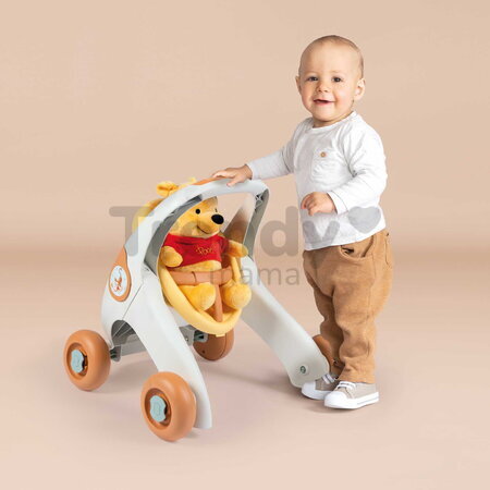 Didaktické chodítko a kočík Winnie the Pooh Baby Walker 3v1 Smoby s 25 cm plyšovou bábikou a brzdami od 12 mes