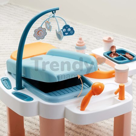 Opatrovateľský stolík pre bábiku Nursery Écoiffier 13 doplnkov s vaničkou od 18 mes