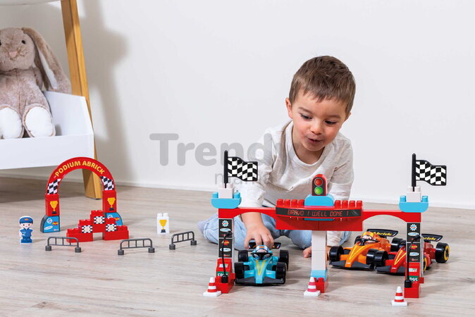 Stavebnica Preteky Formula 1 Grand Prix Abrick Écoiffier s 3 autíčkami a 4 figúrkami od 18 mes