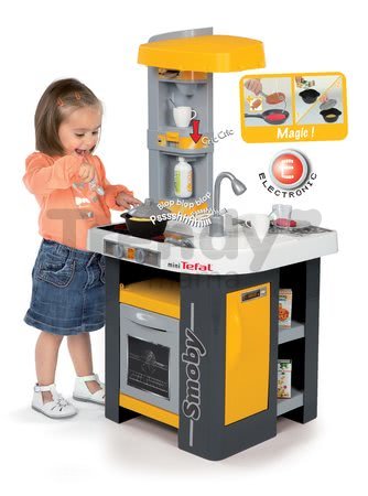 Kuchyňka Tefal Studio Smoby elektronická se zvuky, se sodou, opečenými potravinami a 27 doplňky žluto-šedá
