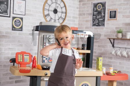 Reštaurácia s elektronickou kuchynkou Chef Corner Restaurant Smoby obojstranná s tečúcou vodou a špecialitami výškovo nastaviteľná 70 doplnkov