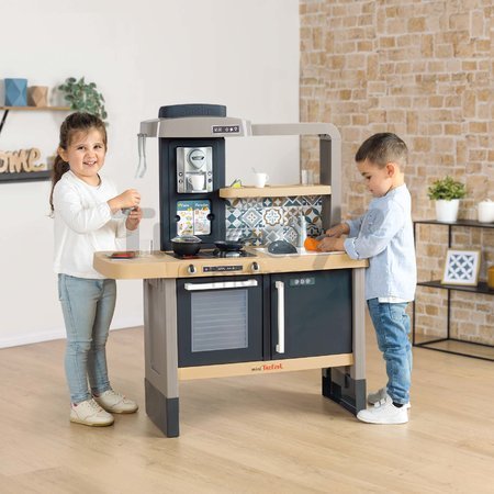 Kuchynka elektronická s nastaviteľnou výškou Tefal Evolutive New Kitchen Smoby so zvukovým sporákom a funkčnými spotrebičmi a 31 doplnkov