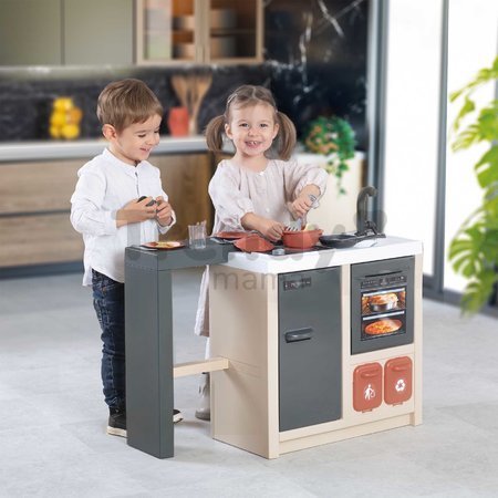 Kuchynka ostrovček s magickými cestovinami Kitchen Island 360° Smoby obojstranná s otvárateľnou rúrou a úložným priestorom 23 doplnkov
