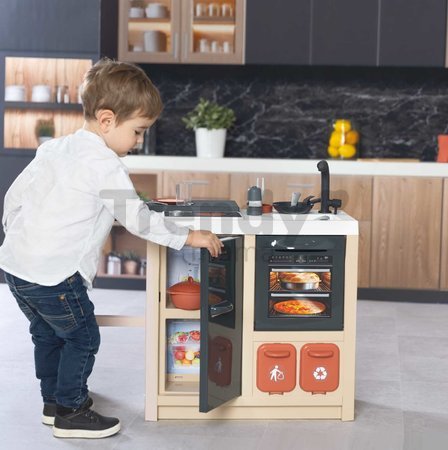 Kuchynka ostrovček s magickými cestovinami Kitchen Island 360° Smoby obojstranná s otvárateľnou rúrou a úložným priestorom 23 doplnkov