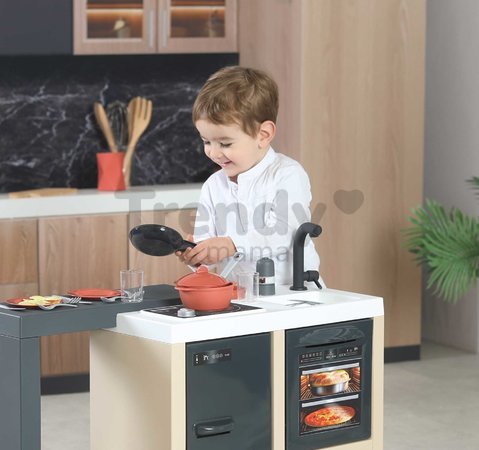Kuchynka ostrovček s magickými cestovinami Kitchen Island 360° Smoby obojstranná s otvárateľnou rúrou a úložným priestorom 23 doplnkov