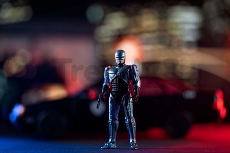 Autíčko RoboCop Ford Taurus 1986 Jada kovové s otvárateľnými časťami a figúrkou Robocop dĺžka 20 cm 1:24