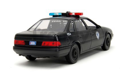 Autíčko RoboCop Ford Taurus 1986 Jada kovové s otvárateľnými časťami a figúrkou Robocop dĺžka 20 cm 1:24