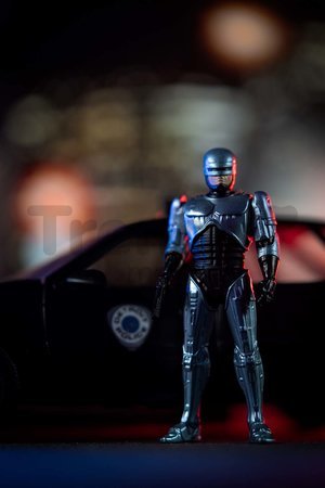 Autíčko RoboCop Ford Taurus 1986 Jada kovové s otvárateľnými časťami a figúrkou Robocop dĺžka 20 cm 1:24
