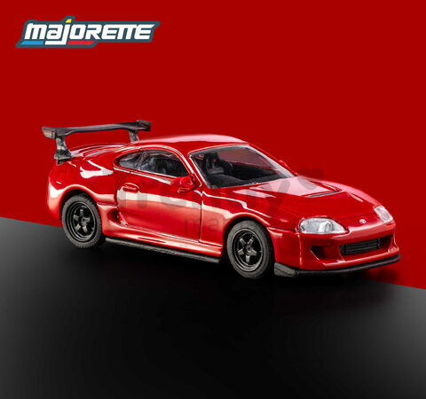 Autíčko Collection 1995 Toyota Supra Majorette mașinuță metalică în cutie de expunere, cu roți din cauciuc; lungime 7,5 cm; scara 1:64