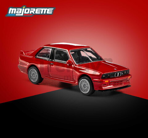 Mașinuță Collection 1986 BMW M3 Majorette mașinuță metalică în cutie de expunere, cu roți din cauciuc; lungime 7,5 cm; 1:64