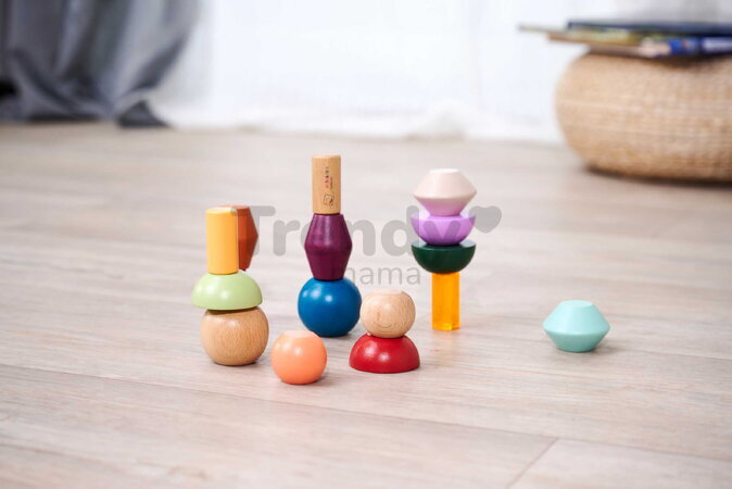 Drevené stohovateľné kocky Montessori Staple Beads Eichhorn 16 farebných dielikov