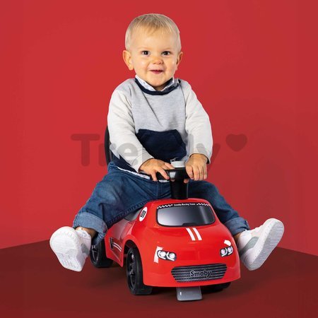 Športové odrážadlo a chodítko s funkčným klaksónom 2v1 Auto Ride On Red Smoby červené s otočnými kolesami a úložným priestorom pod sedadlom od 10 mes