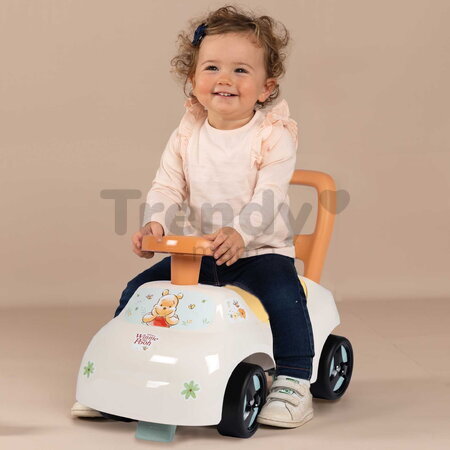 Odrážadlo a chodítko Winnie the Pooh Auto Ride On 2v1 Smoby ergonomicky tvarované sedadlo s úložným priestorom od 10 mes