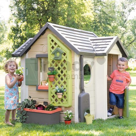 Domček pre záhradníka s kvetináčmi Garden House Life Smoby rozšíriteľný s odkvapom a mriežka s kŕmidlom pre vtáčiky 135 cm s UV filtrom od 24 mes - mo