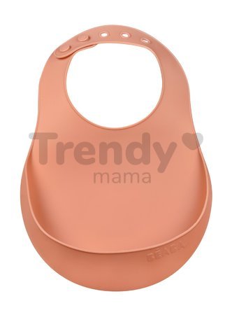 Podbradník pre deti Silicone Bib Beaba Terracotta z mäkkého silikónu a gombíkmi oranžový od 4 mes