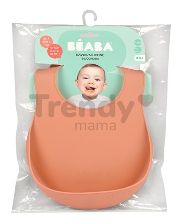 Podbradník pre deti Silicone Bib Beaba Terracotta z mäkkého silikónu a gombíkmi oranžový od 4 mes