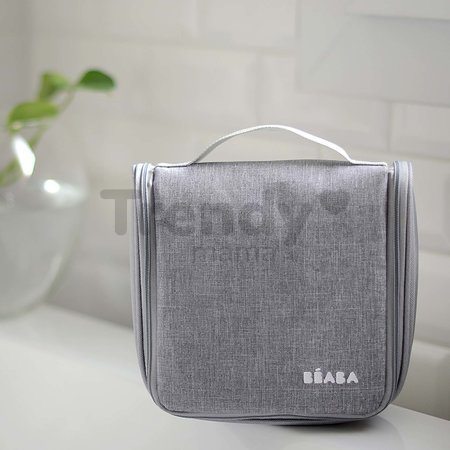 Toaletné potreby pre bábätko Hanging Toiletry Pouch Beaba v závesnej taštičke s 9 doplnkami zeleno-modrá