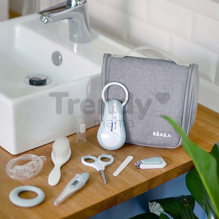 Toaletné potreby pre bábätko Hanging Toiletry Pouch Beaba v závesnej taštičke s 9 doplnkami zeleno-modrá