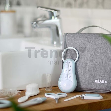 Toaletné potreby pre bábätko Hanging Toiletry Pouch Beaba v závesnej taštičke s 9 doplnkami zeleno-modrá