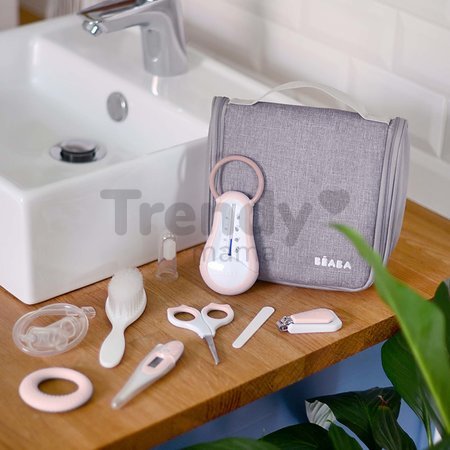 Toaletné potreby pre bábätko Hanging Toiletry Pouch Beaba v závesnej taštičke s 9 doplnkami ružová