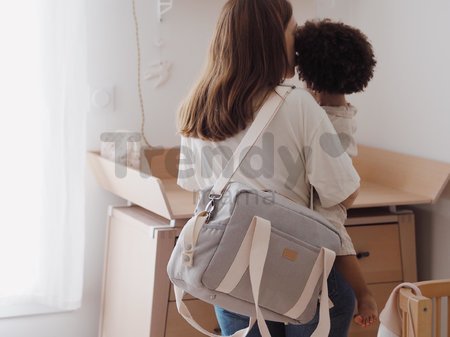 Prebaľovacia taška ku kočíku Changing Bag Paris Beaba Pearl Grey s doplnkami sivá