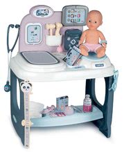 Masă medicală Baby Care Center Smoby electronică cu sunete, lumini și păpușă cu 28 accesorii de la 3 ani