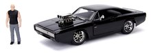 Autíčko Dodge Charger 1970 Fast & Furious Jada kovové s otvárateľnými časťami a figúrkou Dominic Torreto dĺžka 21 cm 1:24