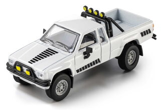 Autíčko Collection 1985 Toyota Hilux SR5 Pick Up Majorette kovové vo výstavnom boxe s gumenými kolieskami dĺžka 7,5 cm 1:64