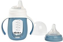 Sticlă pentru a învăța să bea 2in1 Learning Bottle 210ml Blue Beaba cu husă din silicon albastru de la 4 luni