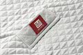 Dojčenský spací vak mäkké hniezdo Pearl Grey Fleur de Coton® Red Castle 12-24 mesiacov prešívaný šedý