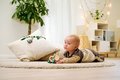 Drevené zvieratko somárik Baby HIPP Push Donkey Eichhorn s textilnou handričkou od 12 mes