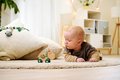 Drevené zvieratko somárik Baby HIPP Push Donkey Eichhorn s textilnou handričkou od 12 mes