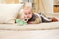 Drevená hrkálka Baby HIPP Grasping Toy Eichhorn s handričkou na maznanie od 12 mes