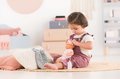 Bábika Bébé Calin Good Night Set Corolle s modrými klipkajúcimi očami a spacím vakom s fľašou a cumlíkom 30 cm od 18 mes