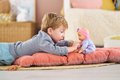 Bábika Bébé Calin Capucine Mon Premier Poupon Corolle s hnedými klipkajúcimi očami 30 cm od 18 mes