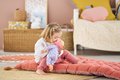 Bábika Bébé Calin Capucine Mon Premier Poupon Corolle s hnedými klipkajúcimi očami 30 cm od 18 mes