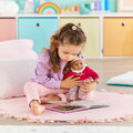Bábika Bébé Calin Maria Pink Grenadine Mon Premier Poupon Corolle s hnedými klipkajúcimi očami 30 cm od 18 mes