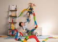 Flexibilná autodráha FleXtreme Discovery Set Smoby 184 dielov dráhy a 440 cm dlhá s elektronickým svietiacim autom od 4 rokov