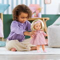 Bábika Candice Ma Corolle krátke blond vlasy a hnedé žmurkajúce oči v ružových vzorovaných šatách 36 cm