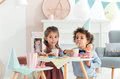 Bábika Mini Corolline Rosy Les Trendies Corolle s modrými očami a ružové kvetinky na šatách 20 cm