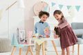 Bábika Mini Corolline Rosy Les Trendies Corolle s modrými očami a ružové kvetinky na šatách 20 cm