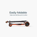 Odrážadlo a kolobežka 2v1 trojkolesová s LED kolesami Xtend Scooter Ride-on Orange smarTrike s vodiacou tyčou s nastaviteľnou výškou a úložným priesto