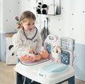 Zdravotnícky pult pre lekára Baby Care Center Smoby elektronický so zvukom a svetlom a bábika s 28 doplnkami