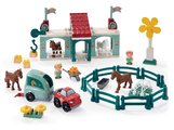 Stavebnica stajňa s veterným mlynom Hippies Centre Abrick Écoiffier s koníkmi autíčkom a 2 figúrkami od 18 mes