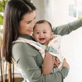 Nosič pre dieťa Flip 4v1 Convertible Carrier Rainbow Infantino 4 spôsoby nosenia so vzorom dúhy od 3,6-14,5 kg od 0 mes