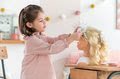Kadernícka česacia hlava Hairdressing Head Corolle s krásne jemnými voňavými vláskami a 20 doplnkami od 3 rokov